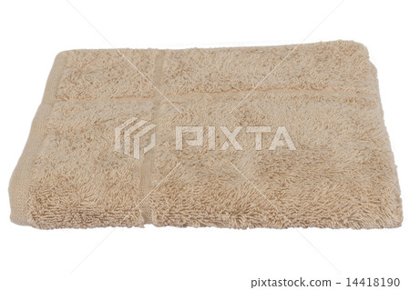 Folded brown bath towels islated in studio on white background 14418190