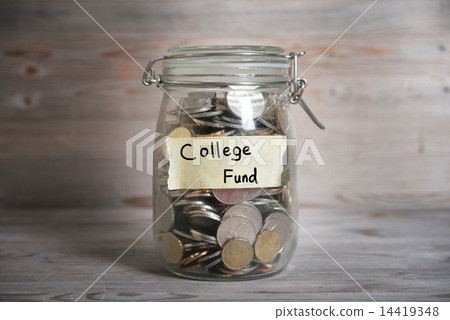Coins in jar with college fund label 14419348