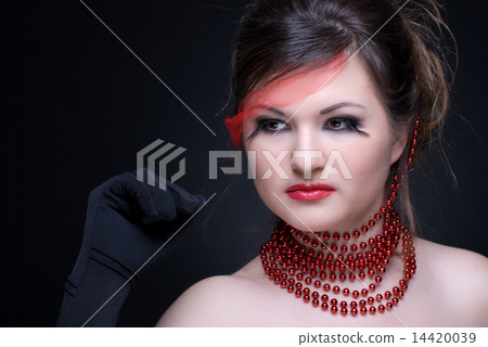 Close up portrait of girl with red lips and beads on black Close up portrait of girl with red lips and beads on black 14420039