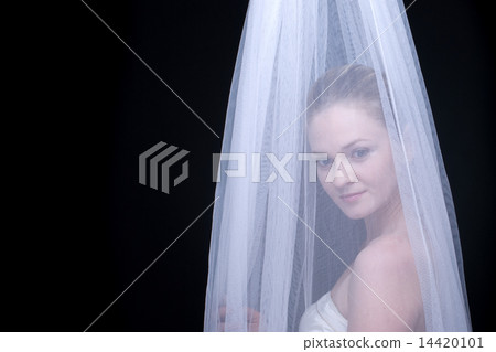 Closeup portrait of beautiful blond girl in white fabric Closeup portrait of beautiful blond girl in white fabric 14420101