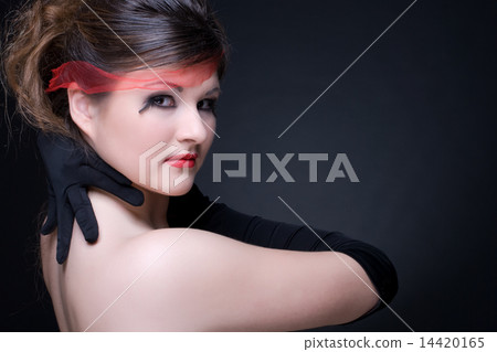 Close up portrait of girl with red lips on black 14420165