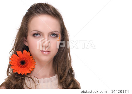 Close up portrait of young beautiful woman with orange flower 14420174