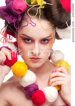 Closeup fashion woman with color face art in knitting style Closeup fashion woman with color face art in knitting style 14420990