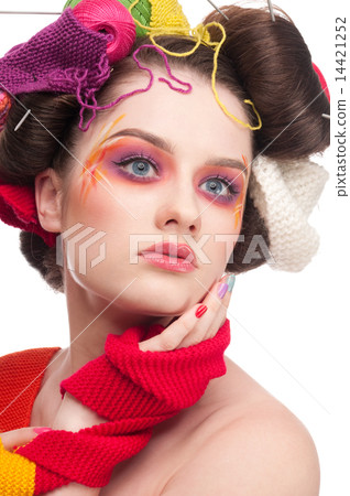 Closeup fashion woman with color face art in knitting style Closeup fashion woman with color face art in knitting style 14421252