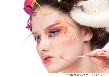 Closeup fashion woman with color face art in knitting style Closeup fashion woman with color face art in knitting style 14421293