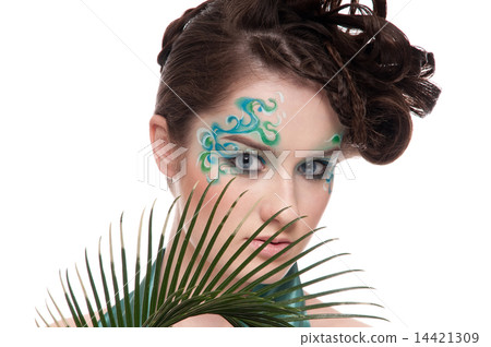 Close-up of sprite girl with faceart and plant 14421309