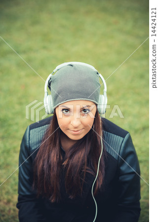young beautiful brunette straight hair woman in the park 14424121