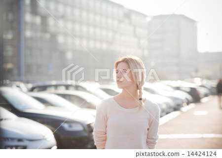 young beautiful blonde woman outdoor 14424124