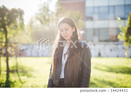 young beautiful long hair woman in town 14424431