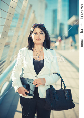 beautiful long black hair elegant business woman with tablet 14424704