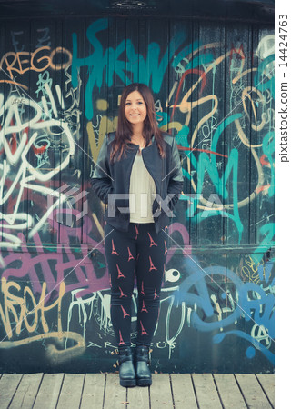 young beautiful brunette straight hair woman in the park young beautiful brunette straight hair woman in the park 14424763