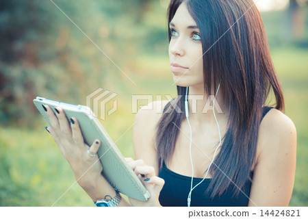 young beautiful brunette straight hair woman using tablet and sm young beautiful brunette straight hair woman using tablet and sm 14424821