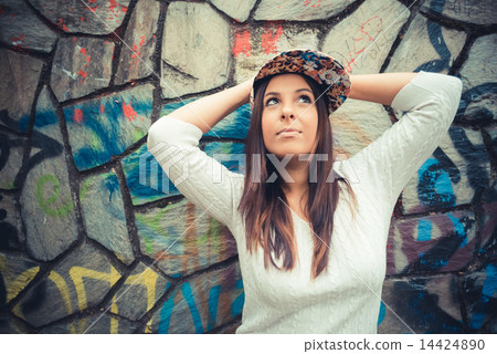 young beautiful brunette straight hair woman in the park 14424890