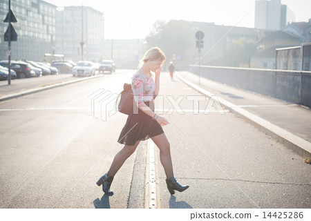 young beautiful blonde woman outdoor 14425286