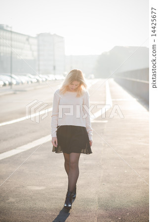 young beautiful blonde woman outdoor 14425677