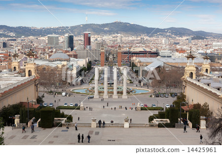Columns near magic fountain with Venetian Towers in the background, Barcelona, Catalonia, Spain 14425961