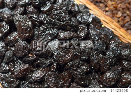 Dried plums for sale at a market stall, La Boqueria Market, Barcelona, Catalonia, Spain Dried plums for sale at a market stall, La Boqueria Market, Barcelona, Catalonia, Spain 14425998