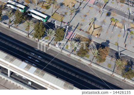 Overhead view of two buses on the port road, Barcelona, Catalonia, Spain Overhead view of two buses on the port road, Barcelona, Catalonia, Spain 14426135