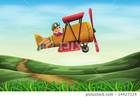 A pilot flying a propeller A pilot flying a propeller 14427324