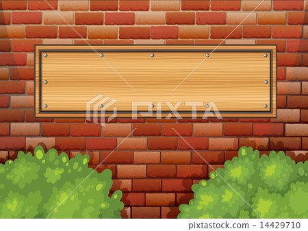 A stonewall with an empty signboard 14429710
