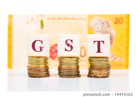 GST concept with stack of coins  14454162