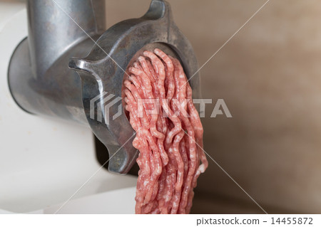 Mincer with fresh chopped meat 14455872