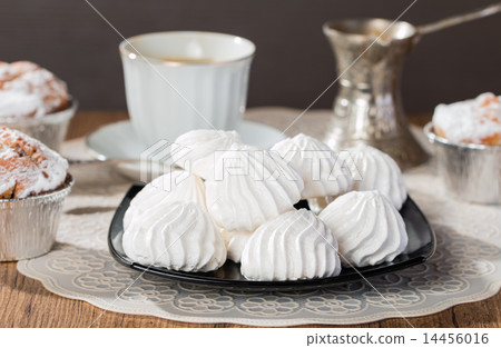 french meringue sweets muffins and coffee cup french meringue sweets muffins and coffee cup 14456016