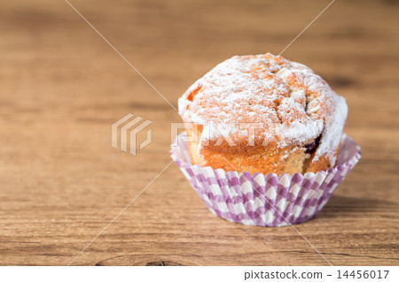 homemade muffins over wooden board selective focus homemade muffins over wooden board selective focus 14456017