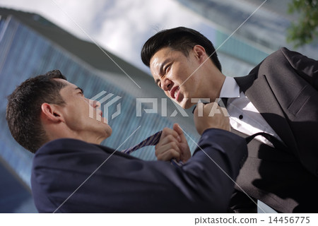 Two employees fighting each other Two employees fighting each other 14456775