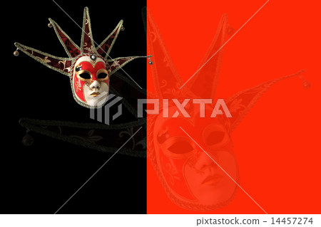 Traditional Venetian mask on a black and red Traditional Venetian mask on a black and red 14457274