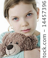 Portrait of pretty little girl holding teddy bear on white 14457396