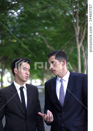 Two businessmen from different background in a discussion Two businessmen from different background in a discussion 14460787
