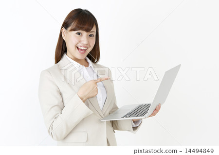 A woman at a notebook PC 14494849