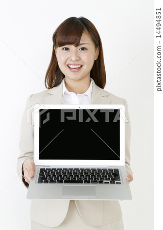 A lady with a laptop 14494851
