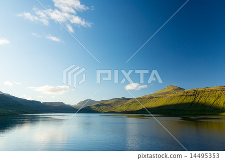 Seascape, mountains on the horizon. 14495353