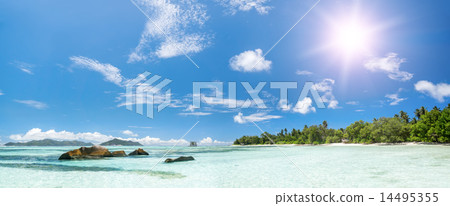 White coral beach sand and azure indian ocean. White coral beach sand and azure indian ocean. 14495355