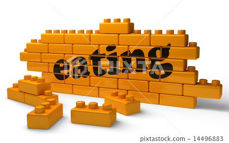 eating word on yellow brick wall 14496883