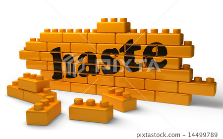 haste word on yellow brick wall 14499789