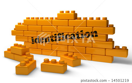 identification word on yellow brick wall 14501219