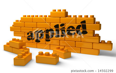 applied word on yellow brick wall 14502299