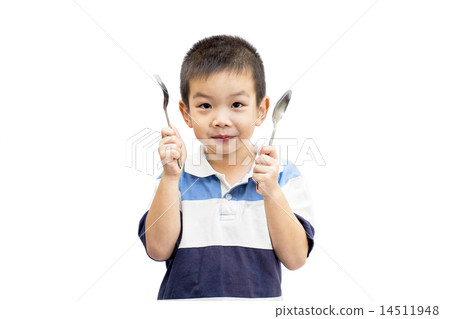 Little boy holding spoon and fork Little boy holding spoon and fork 14511948