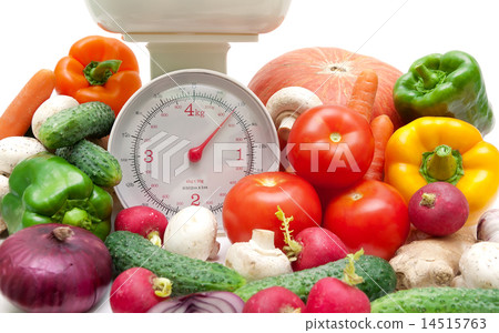 fresh food and kitchen scale closeup 14515763
