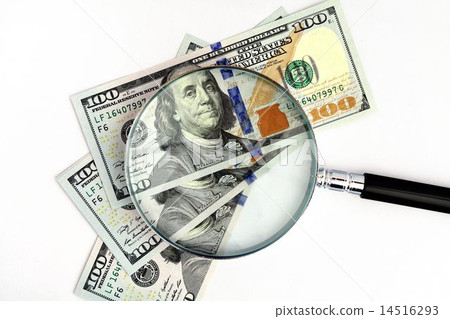 Key currency US dollar bills and magnifying glasses 14516293