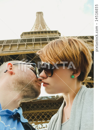 Young couple near the Eiffel Tower in Paris 14516855