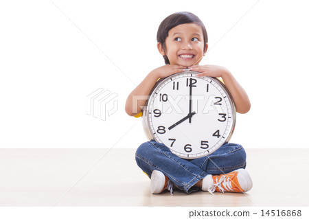 boy is holding big clock boy is holding big clock 14516868