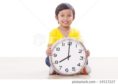 boy is holding big clock  14517227