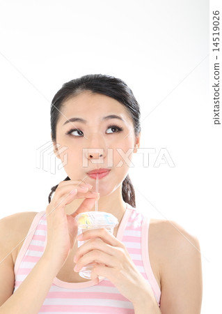 Woman driking water looking up right 14519026