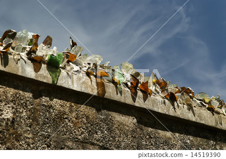 Fence with broken glass for protection  14519390