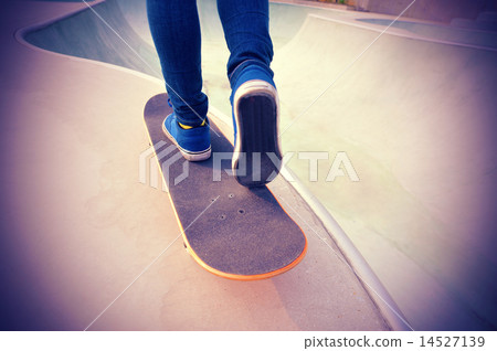 skateboarding woman legs at skatepark skateboarding woman legs at skatepark 14527139