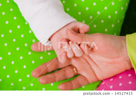Hand of a little baby in mother's hand Hand of a little baby in mother's hand 14527415